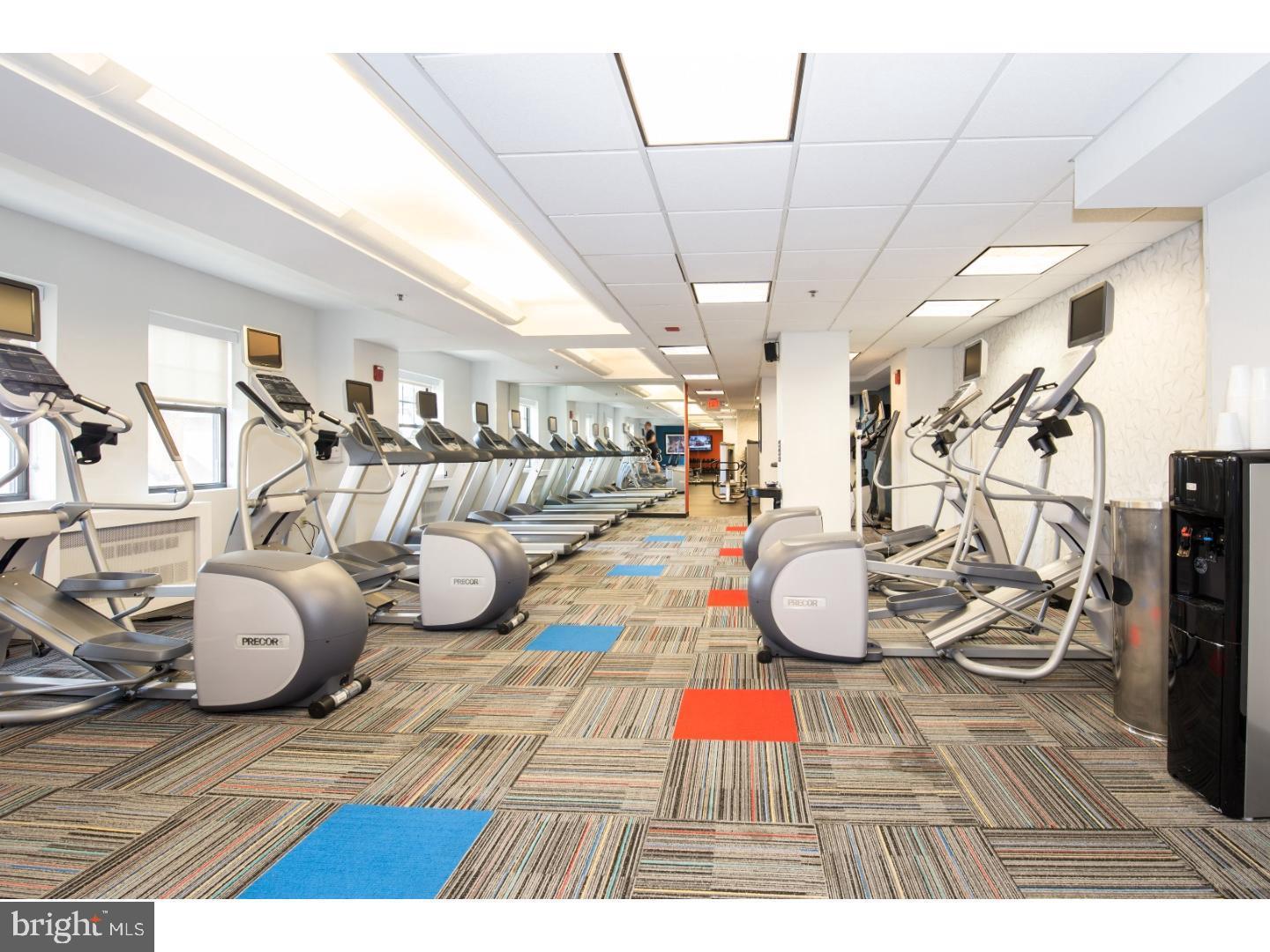 1701 Locust Street, Unit 1517 Philadelphia, PA 19103 - Photo 15 of 16 a view of a room with gym equipment