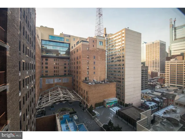 a view of city with tall buildings