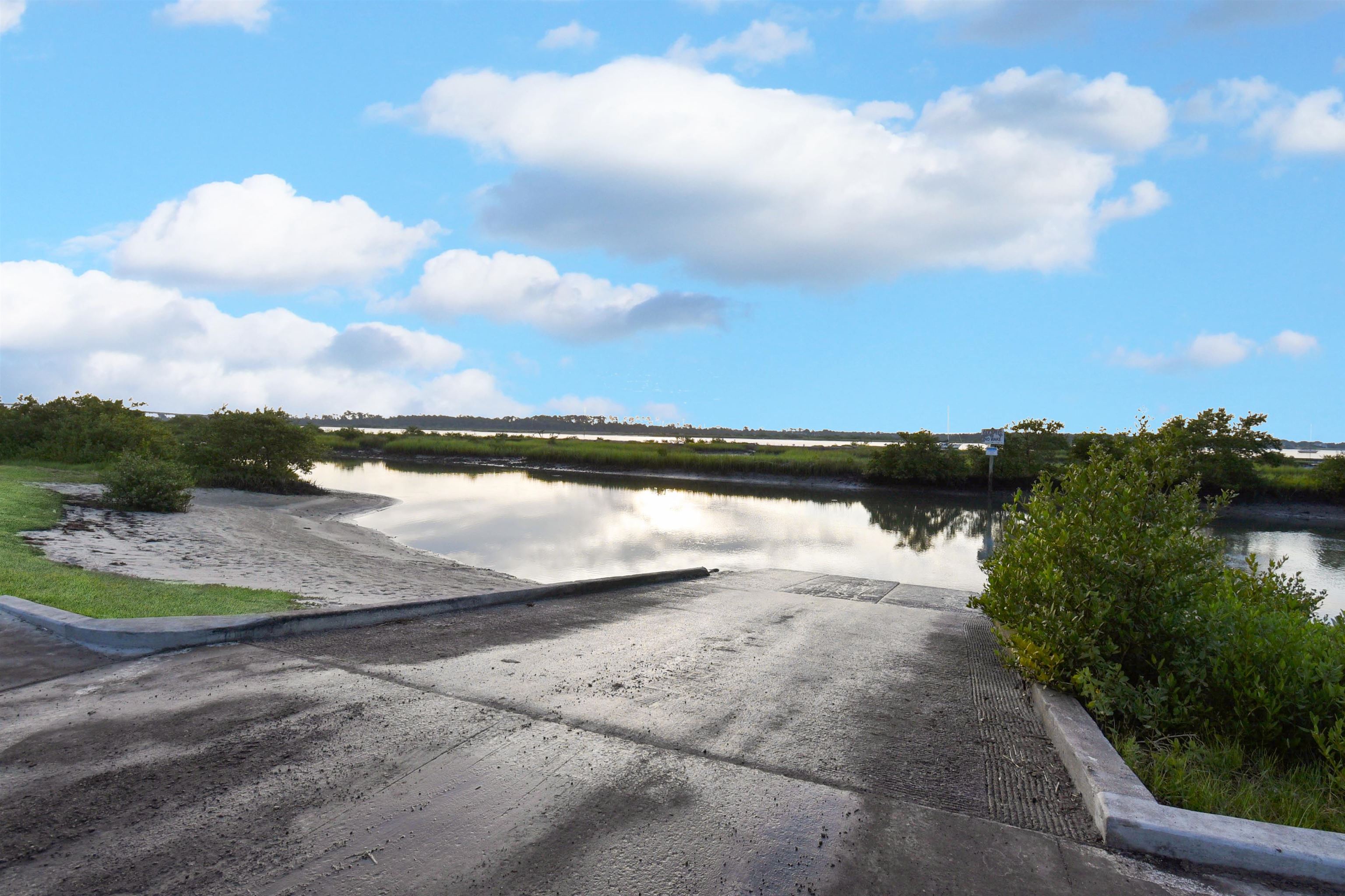 131 Osprey Road St. Augustine, FL 32086 - Photo 43 of 50 a view of a lake with a big yard