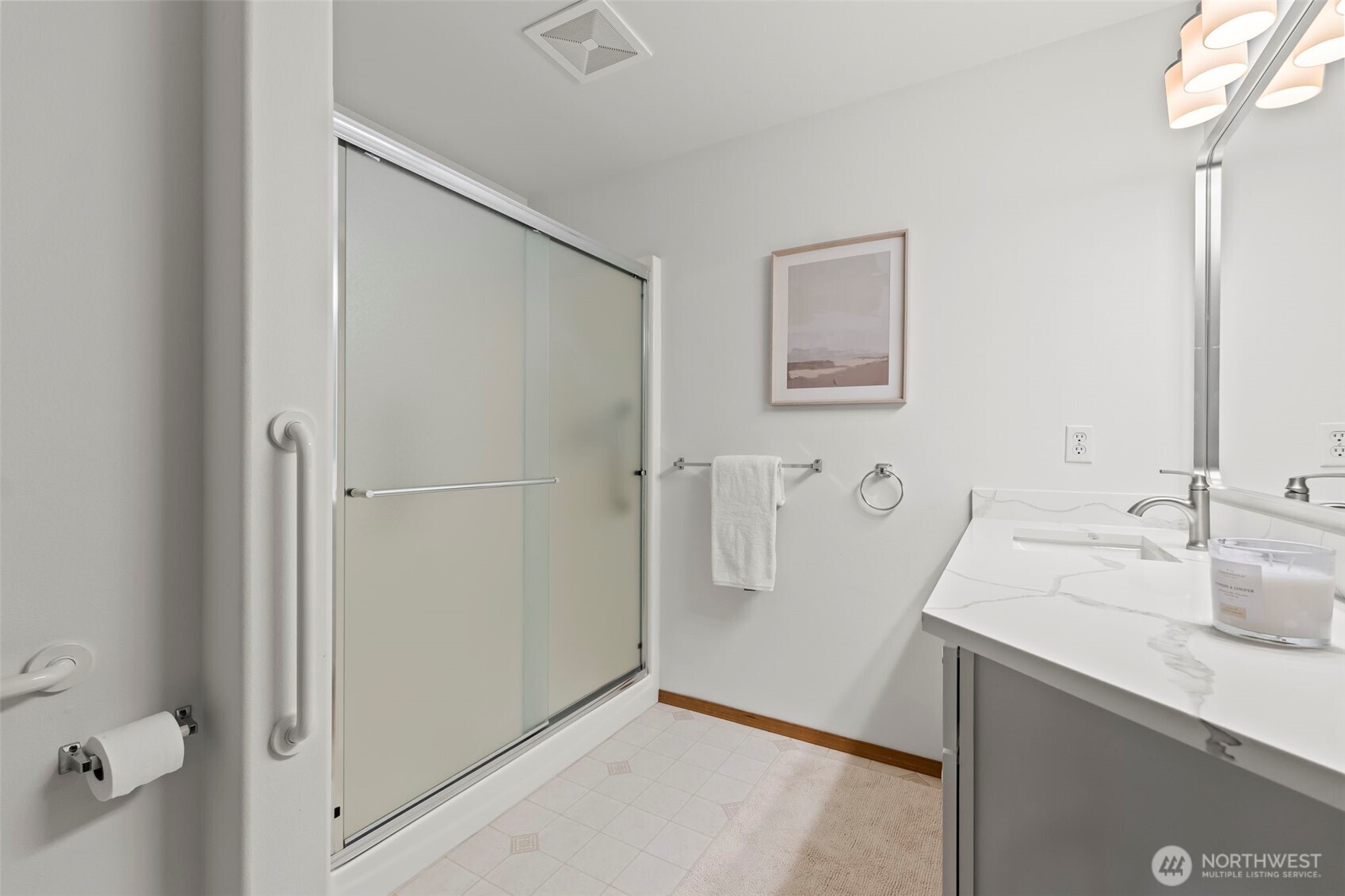 5203 53rd Street West University Place, WA 98467 - Photo 15 of 24 a bathroom with a sink and mirror
