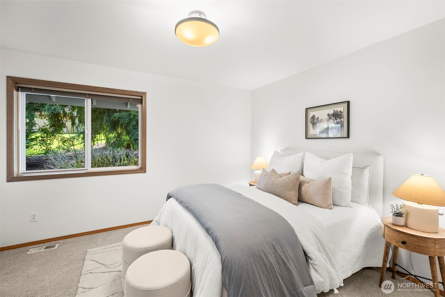 5203 53rd Street West University Place, WA 98467 - Photo 16 of 24 a bedroom with a bed and a window