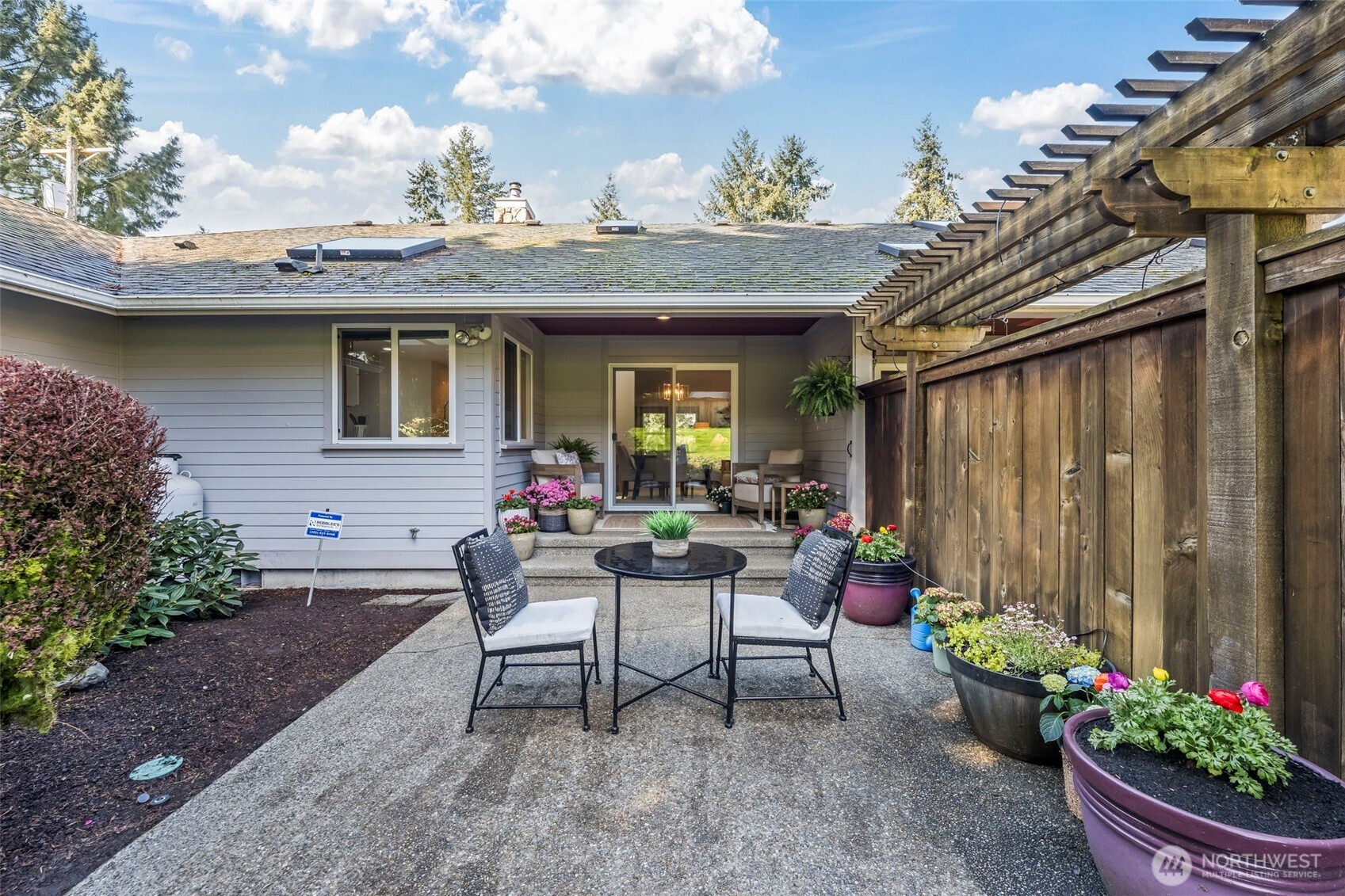 5203 53rd Street West University Place, WA 98467 - Photo 20 of 24 a view of a house with backyard and sitting area