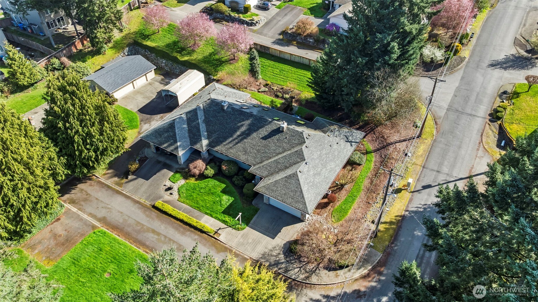 5203 53rd Street West University Place, WA 98467 - Photo 23 of 24 an aerial view of a house a garden and swimming pool