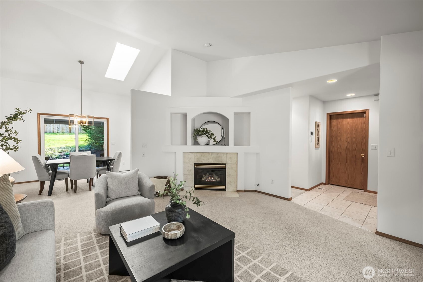 5203 53rd Street West University Place, WA 98467 - Photo 6 of 24 a living room with furniture and a fireplace