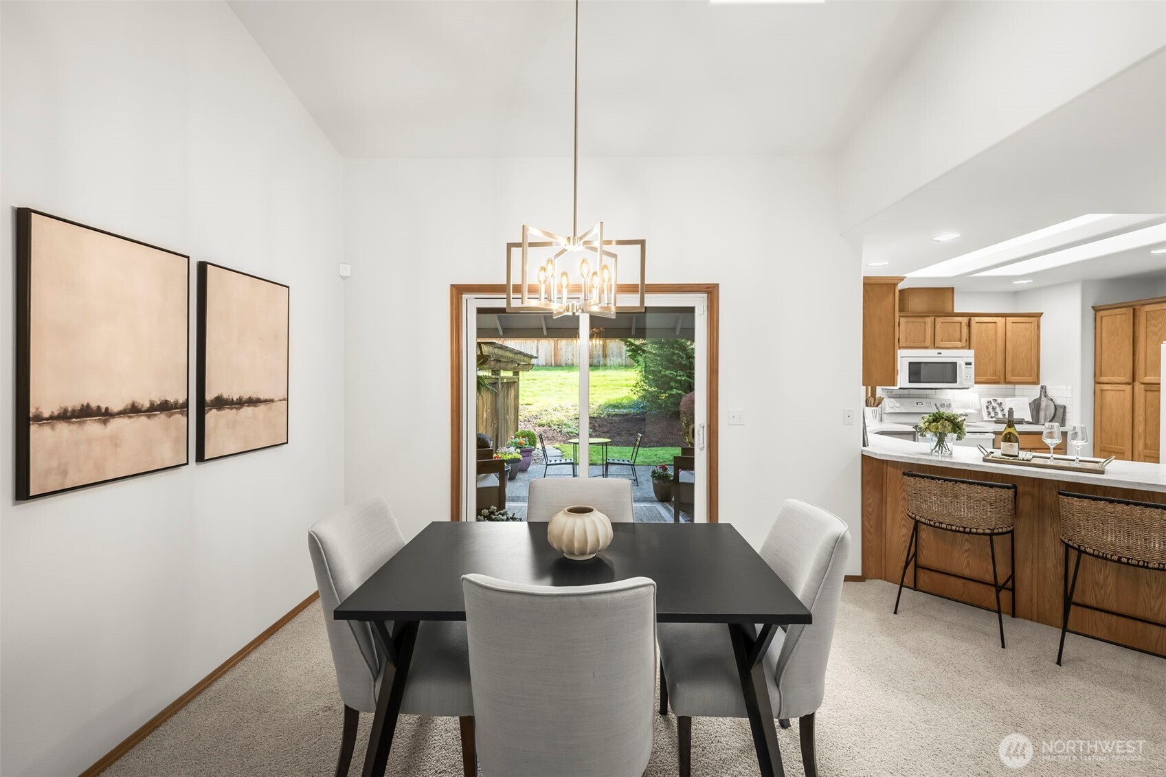 5203 53rd Street West University Place, WA 98467 - Photo 7 of 24 a view of a dining room with furniture window and outside view