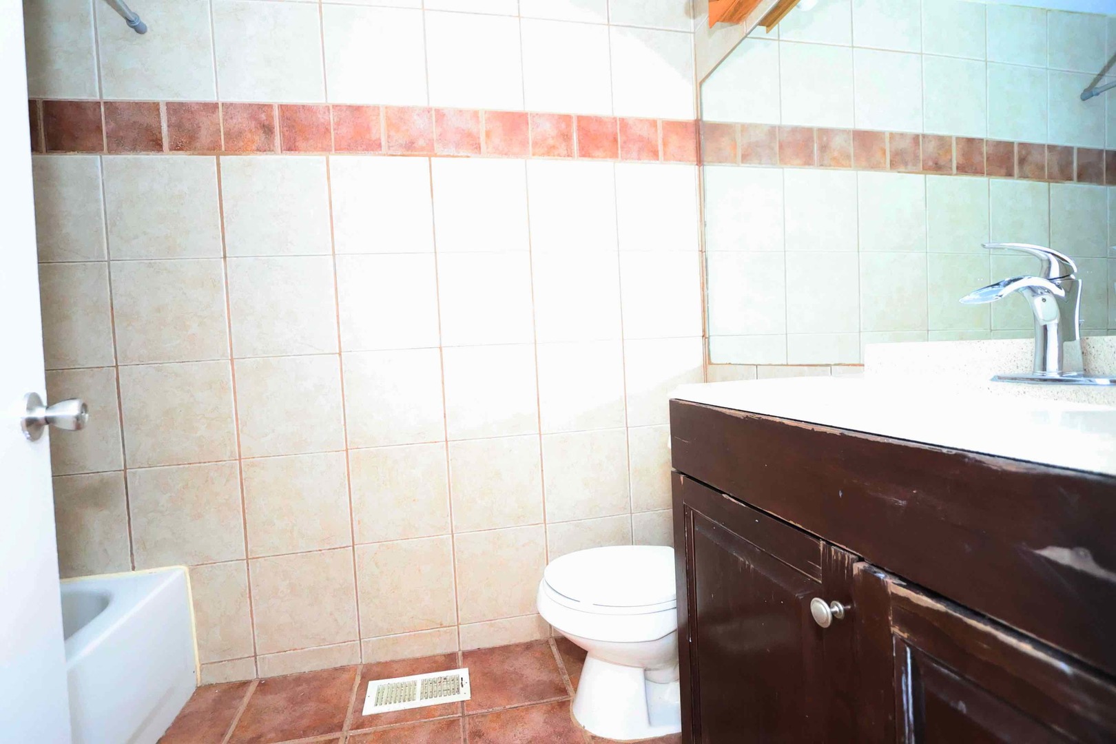 427 Mallview Lane, Unit 427 Bolingbrook, IL 60440 - Photo 13 of 16 a bathroom with a sink a toilet and shower