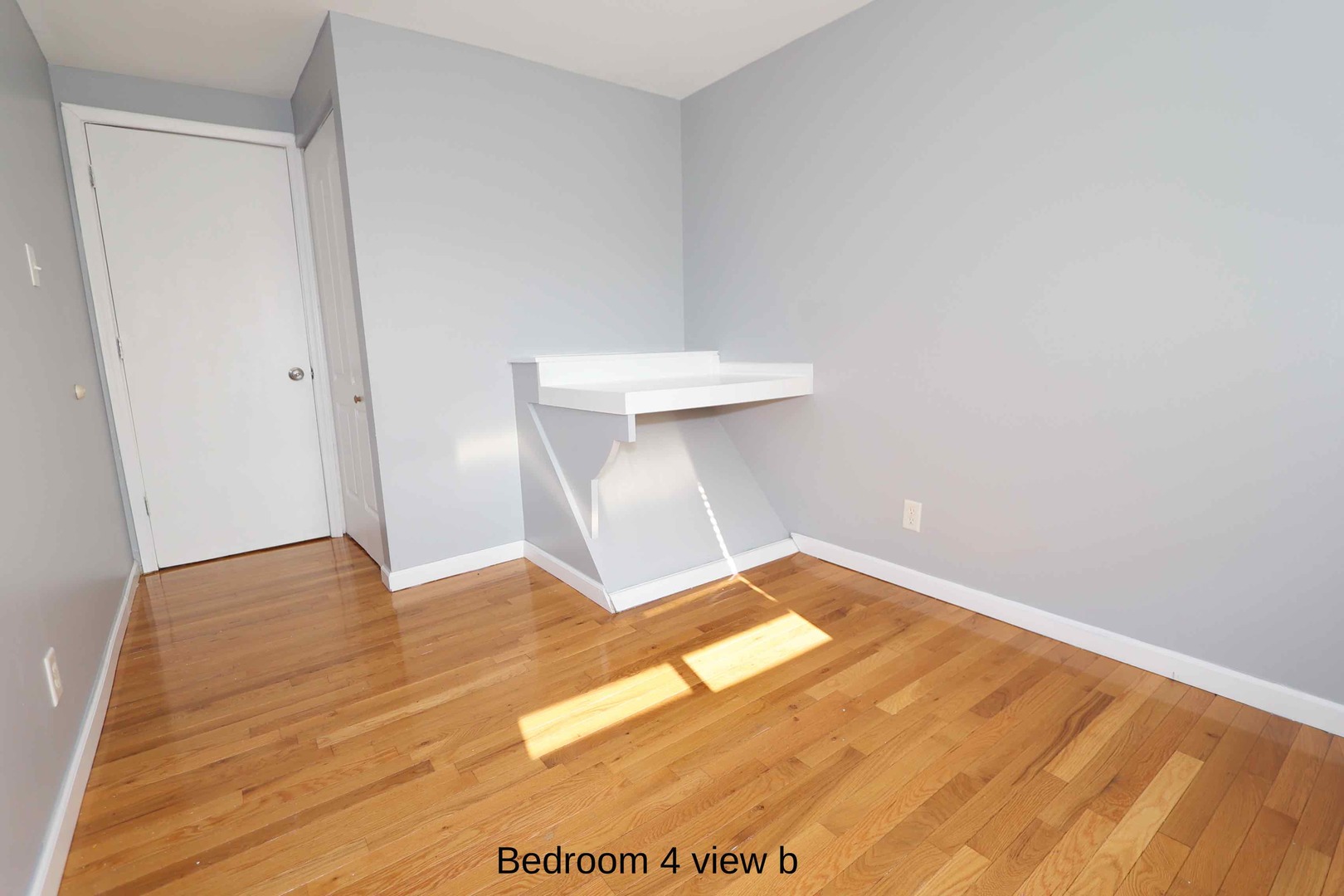 427 Mallview Lane, Unit 427 Bolingbrook, IL 60440 - Photo 10 of 16 a view of empty room with wooden floor