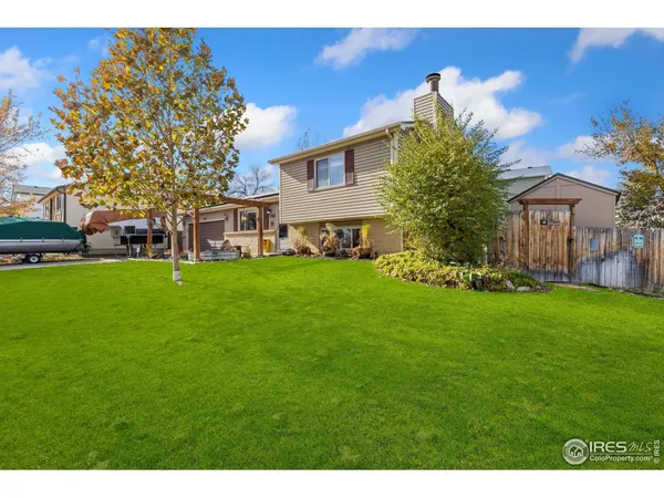 a view of a house with a big yard