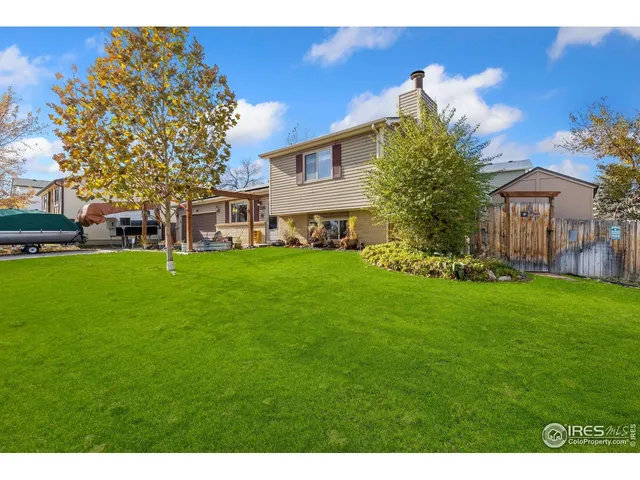 a view of a house with a big yard
