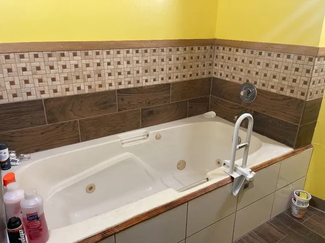 a bathroom with a sink and mirror