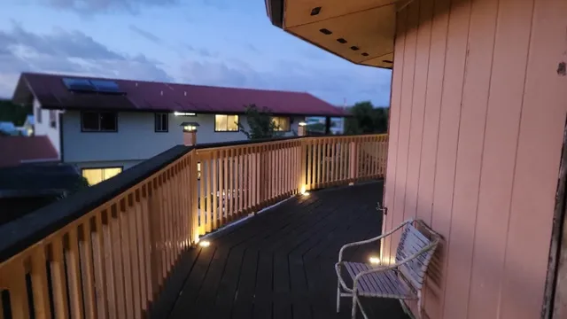 a view of balcony with furniture