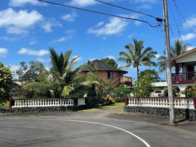 a view of a street in front of a building