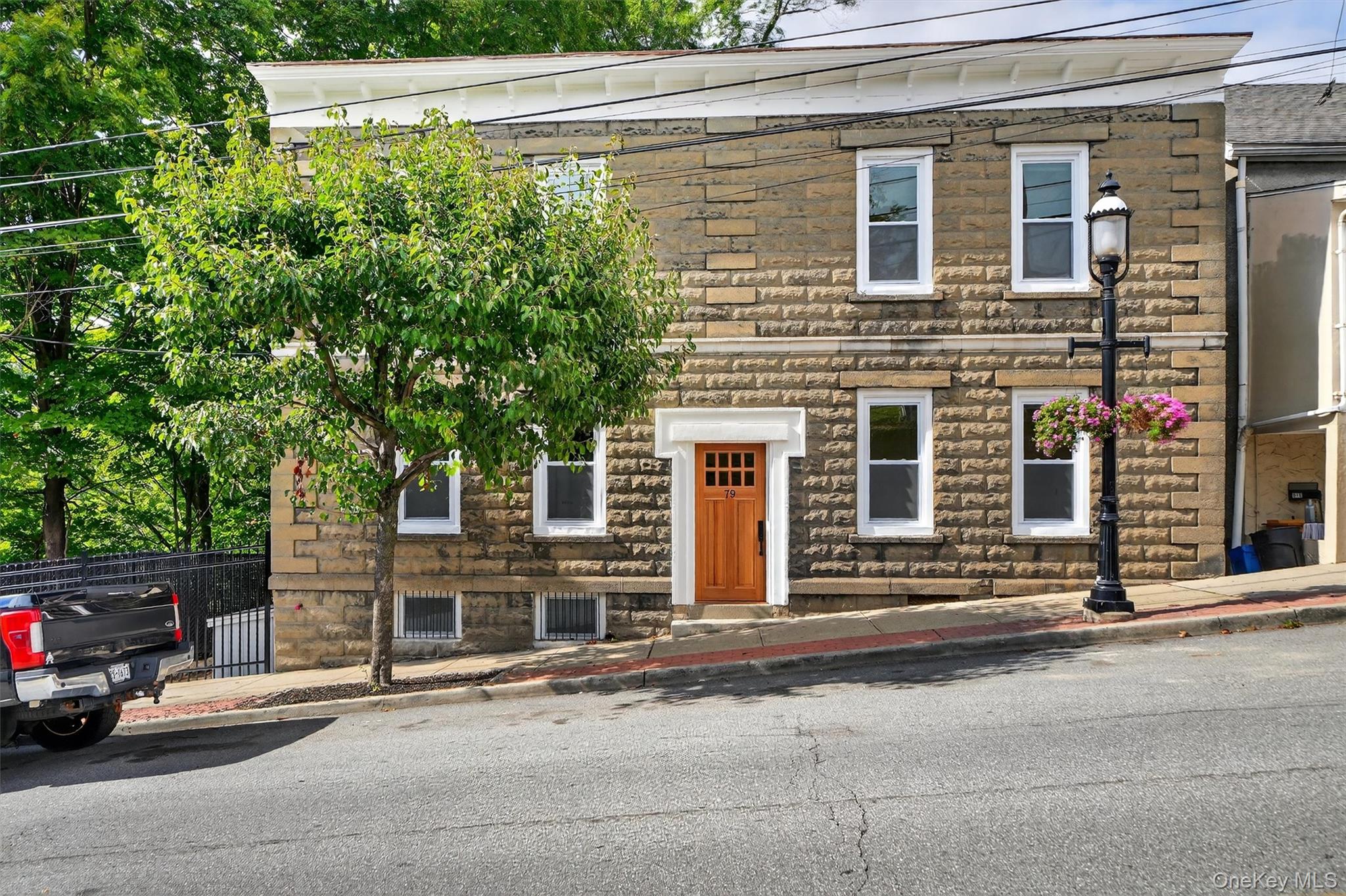 front view of a house with a street