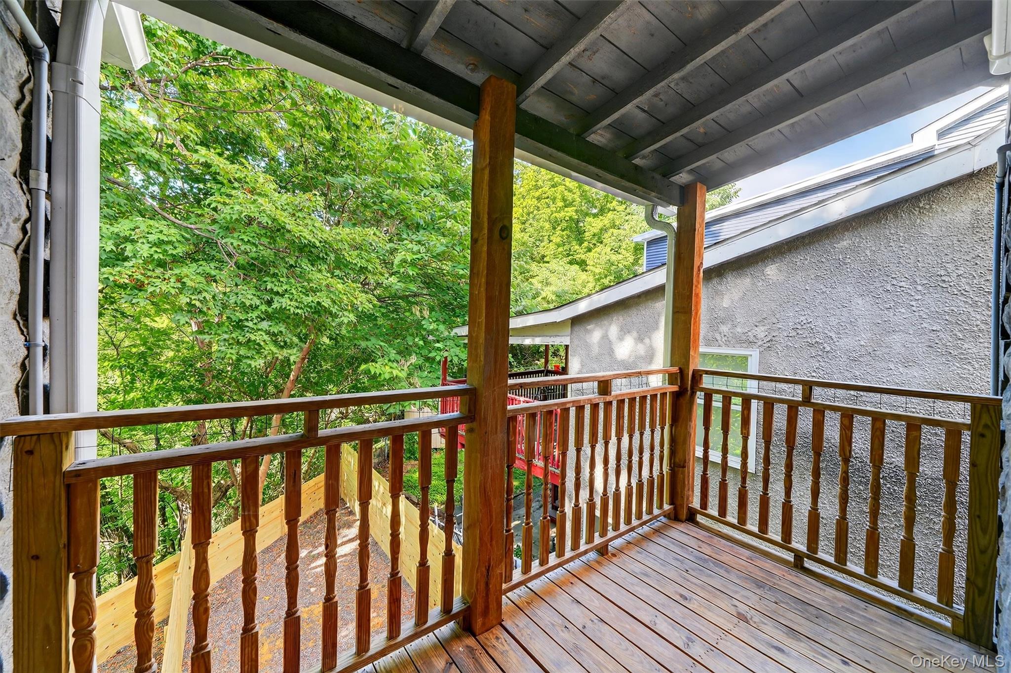 79 Main Street, Unit 2E Ossining, NY 10562 - Photo 18 of 20 a view of a porch with wooden floor