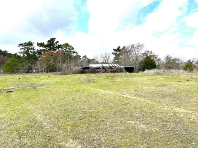 a view of lake with green space