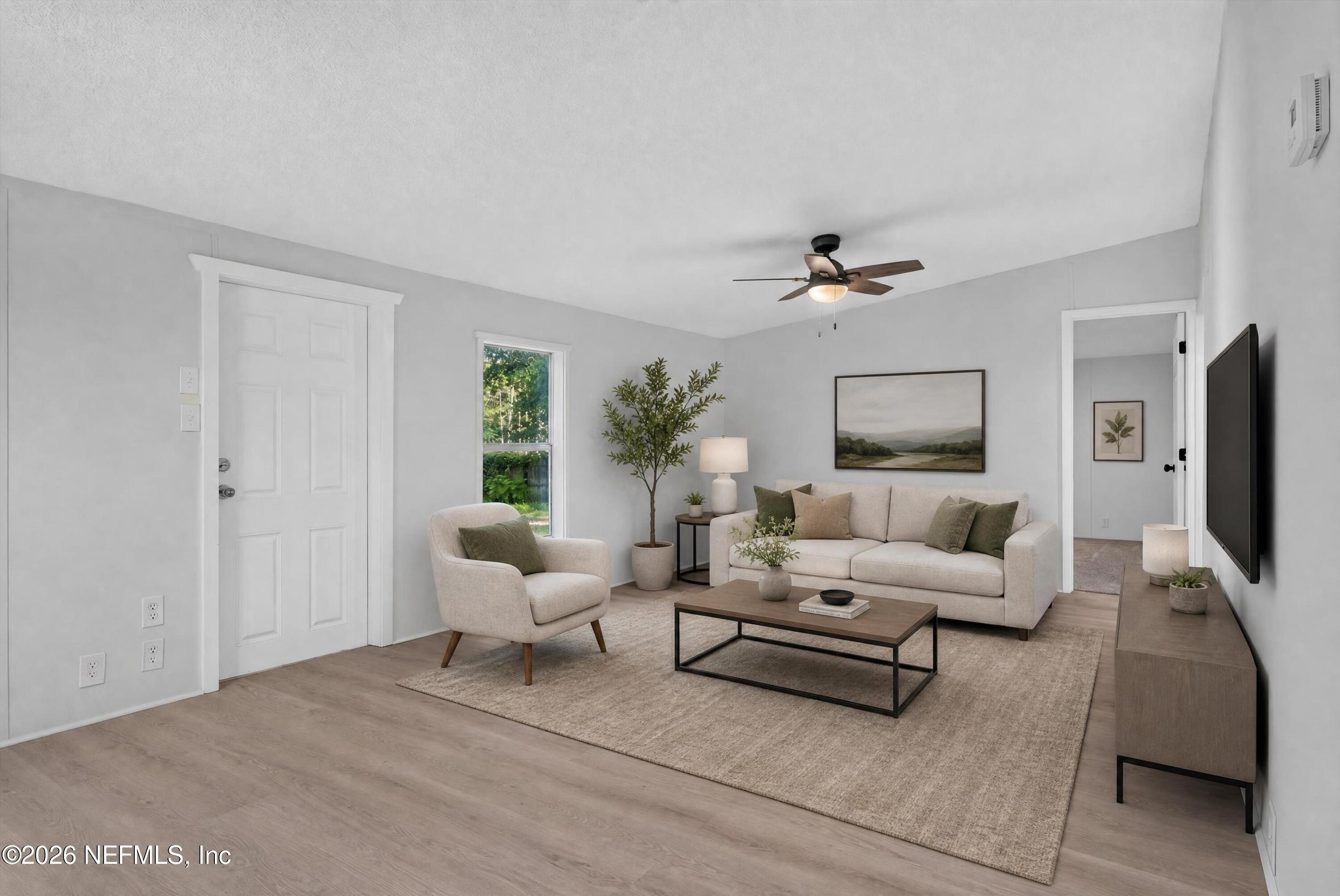 55520 Jewel-Thomas Road Callahan, FL 32011 - Photo 15 of 50 15-55520 Jewel-Thomas Rd-41 Family Room
