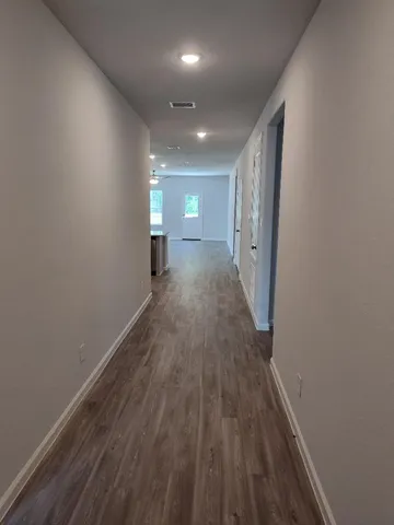a stove top oven sitting inside of a kitchen