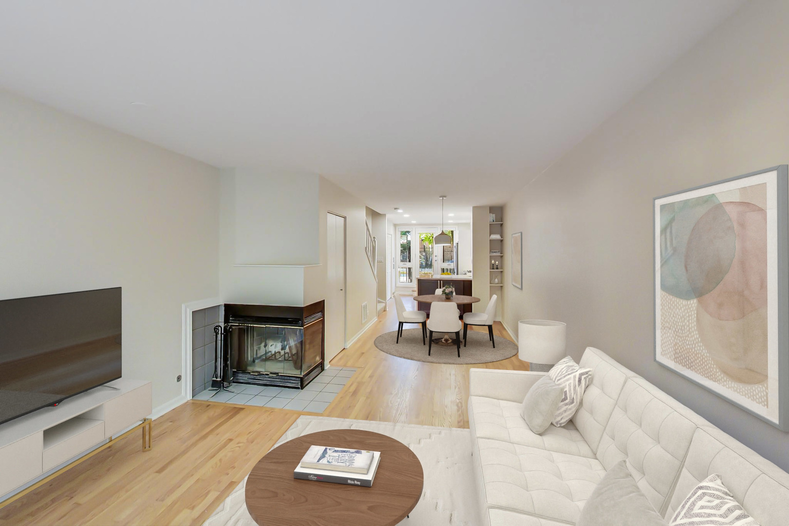 20 West 15th Street, Unit B Chicago, IL 60605 - Photo 7 of 21 a living room with furniture a flat screen tv and a fireplace