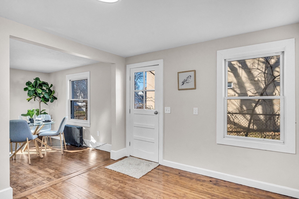 97 Parallel Street Springfield, MA 01104 - Photo 12 of 42 a living room with furniture and a window
