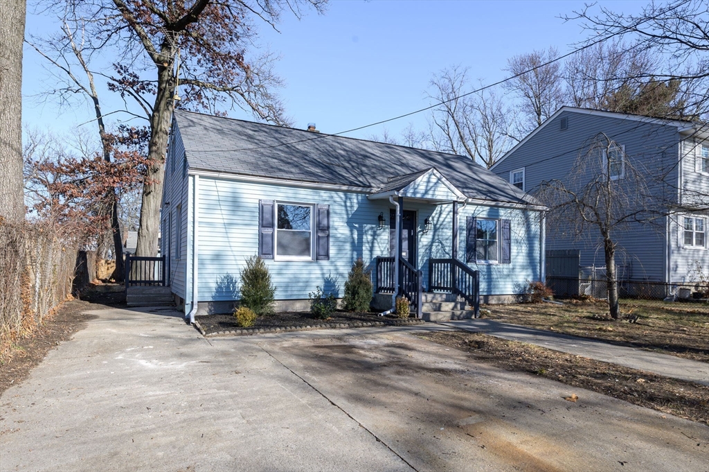 97 Parallel Street Springfield, MA 01104 - Photo 2 of 42 a view of a house with a backyard