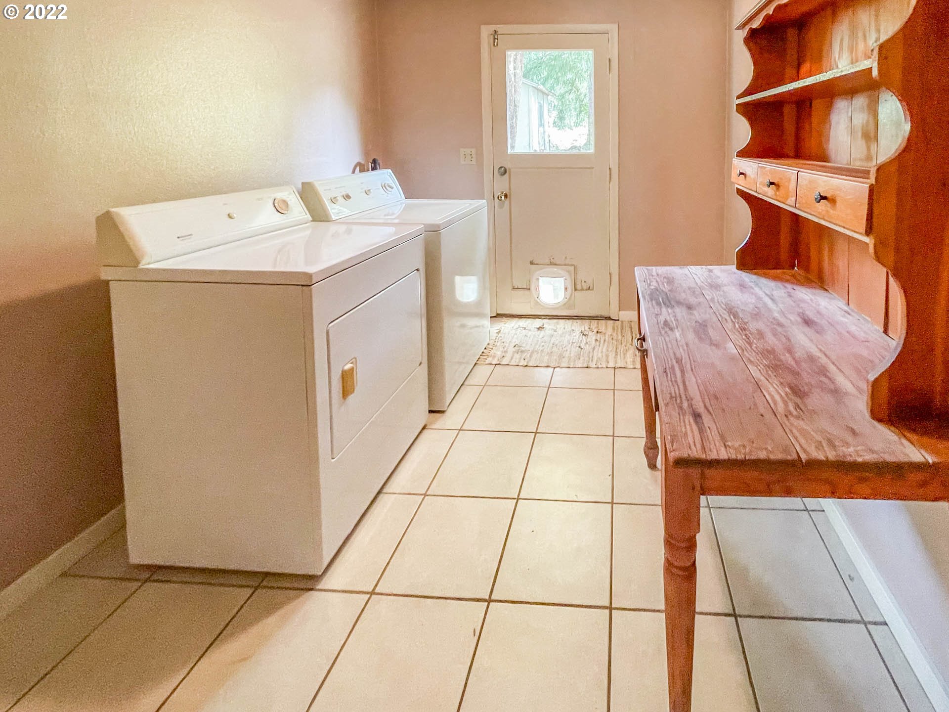 695 Lone Rock Road Glide, OR 97443 - Photo 17 of 48 a utility room with dryer and washer