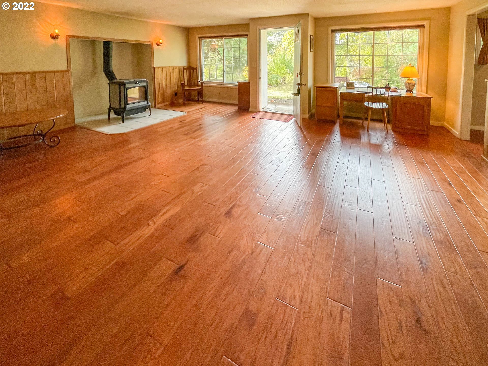 695 Lone Rock Road Glide, OR 97443 - Photo 3 of 48 a living room with furniture and a table with wooden floor