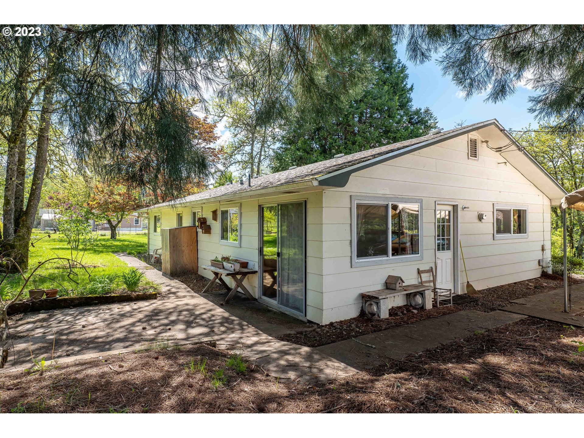 695 Lone Rock Road Glide, OR 97443 - Photo 38 of 48 a view of a house with backyard