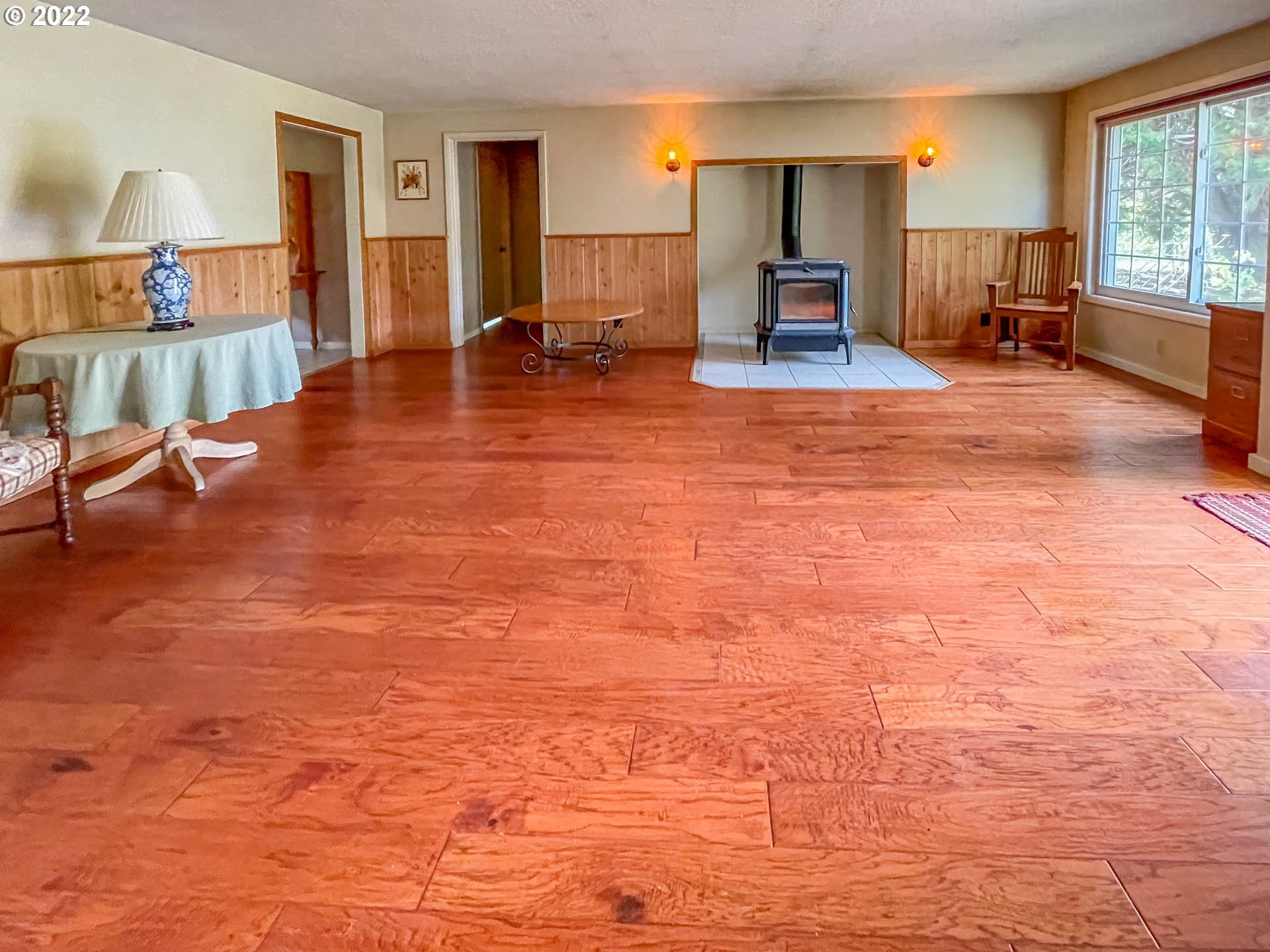 695 Lone Rock Road Glide, OR 97443 - Photo 4 of 48 a living room with furniture and a table with kitchen view