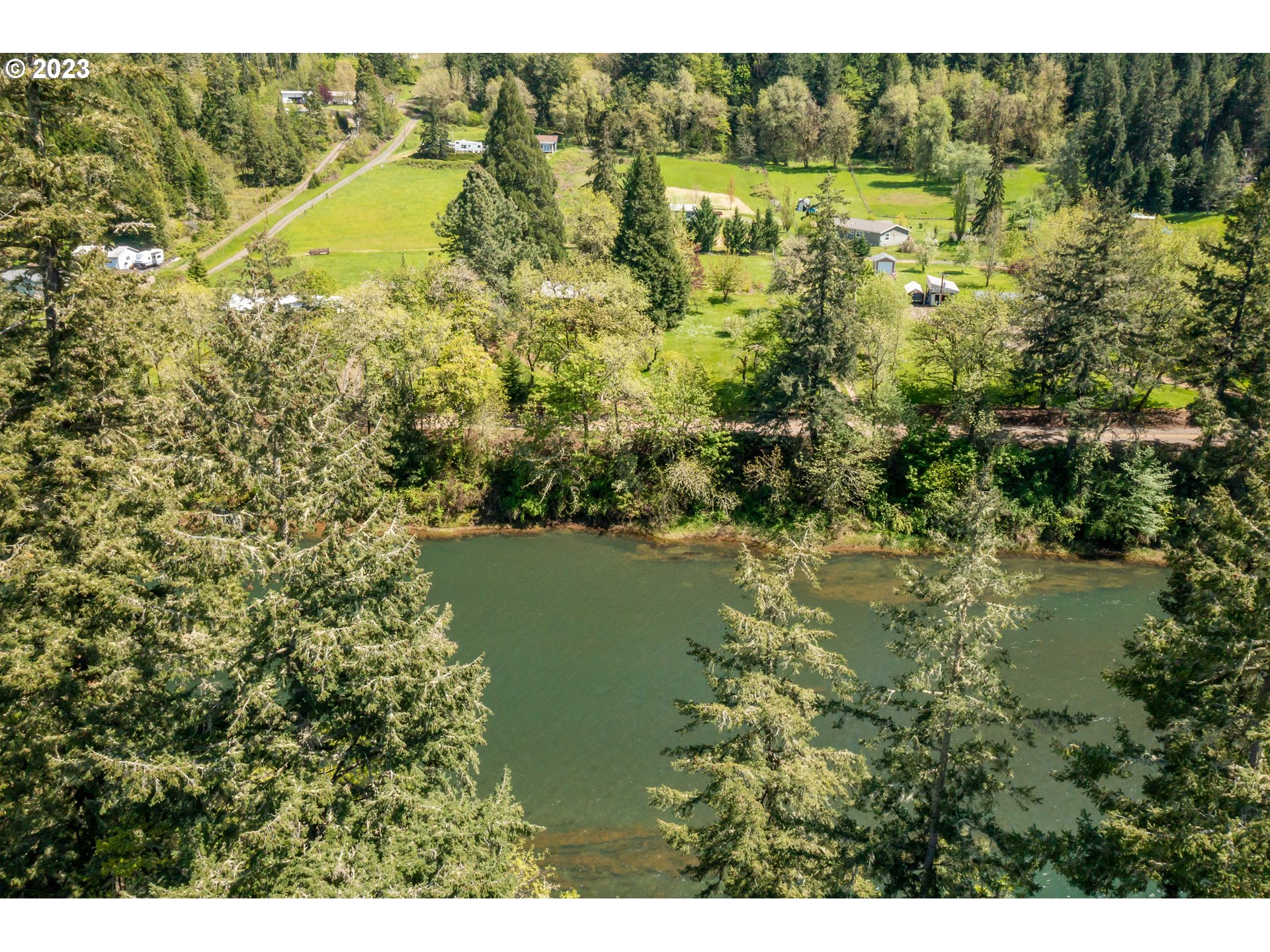695 Lone Rock Road Glide, OR 97443 - Photo 45 of 48 a view of lake with green space