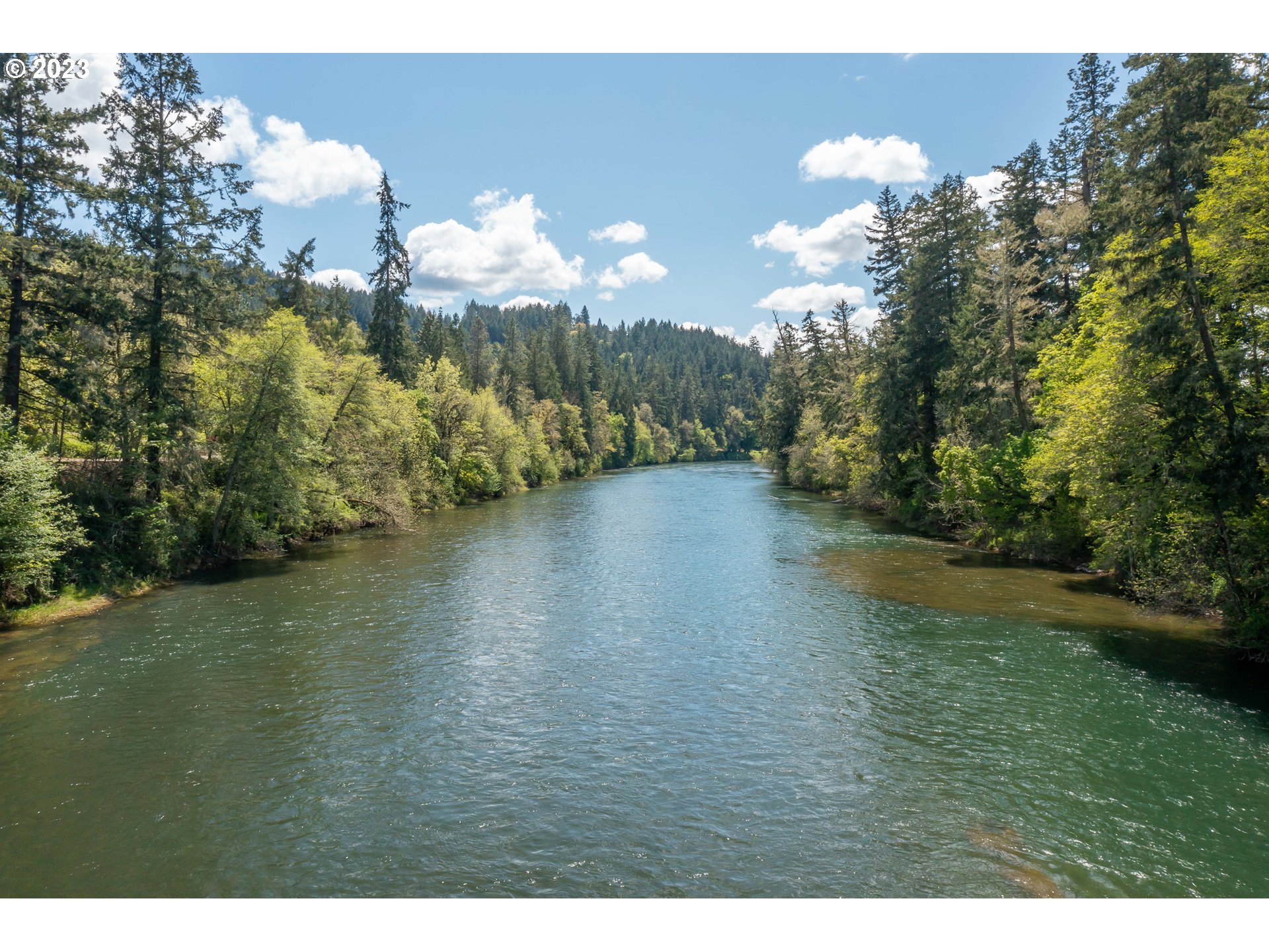 695 Lone Rock Road Glide, OR 97443 - Photo 46 of 48 a view of a lake in middle of the forest