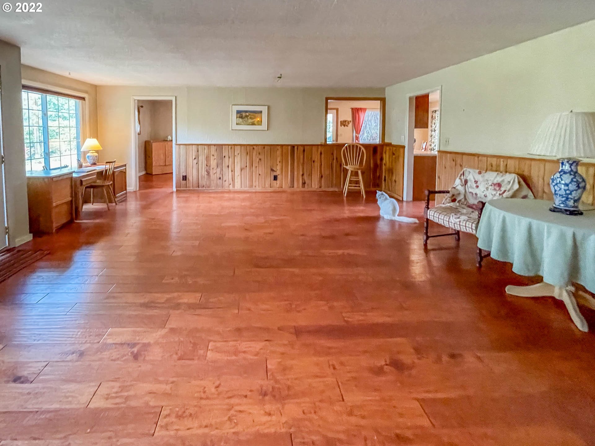 695 Lone Rock Road Glide, OR 97443 - Photo 5 of 48 a living room with furniture and a wooden floor