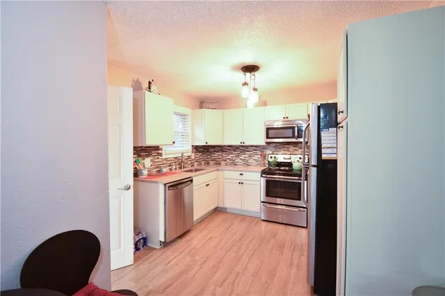 $239,900 | 5216 North Palmer Avenue, Kansas City, MO 64119