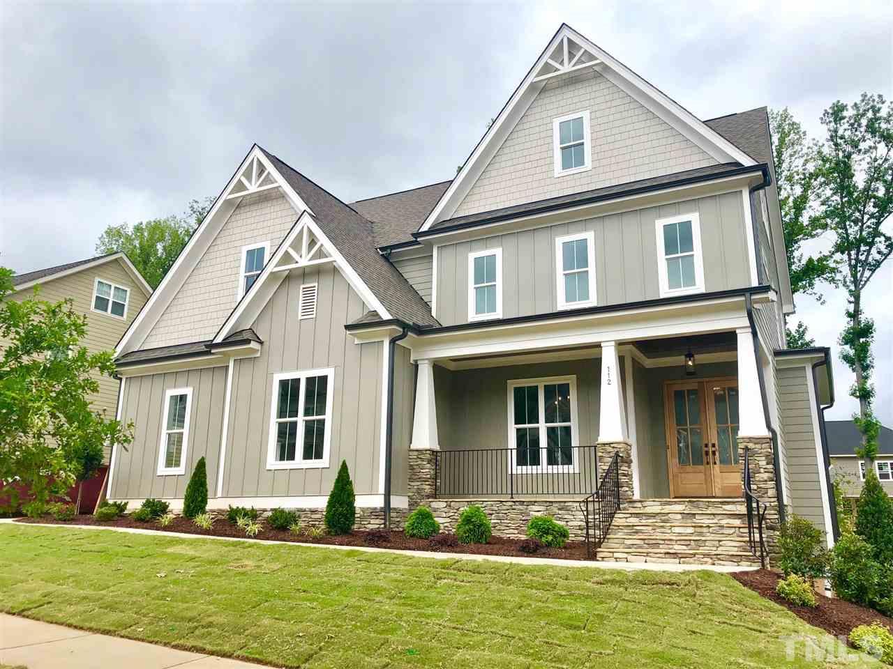 112 Roseroot Court Holly Springs, NC 27540 - Photo 1 of 30 a front view of a house with a yard