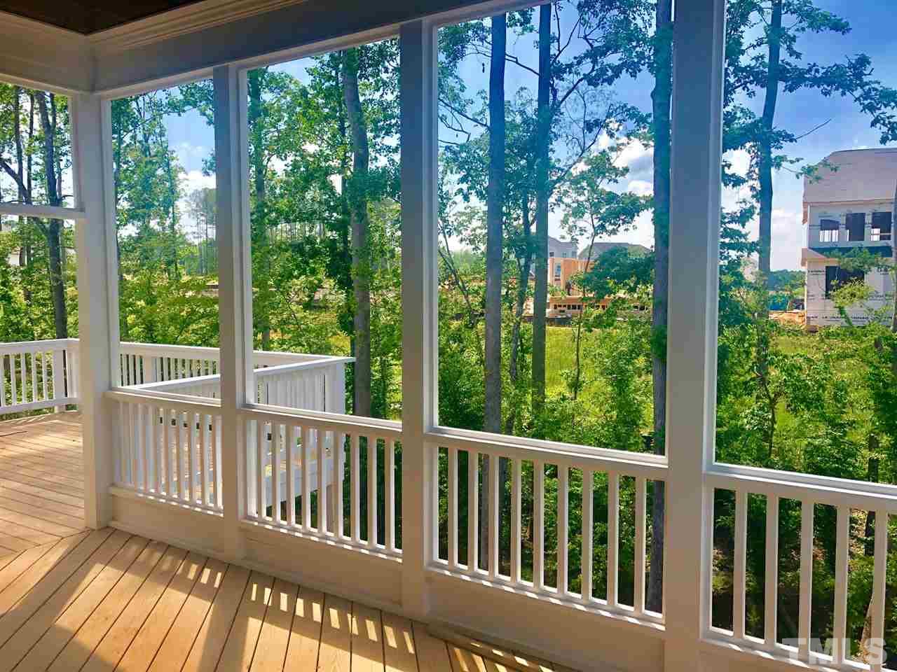 112 Roseroot Court Holly Springs, NC 27540 - Photo 17 of 30 a view of a wooden deck
