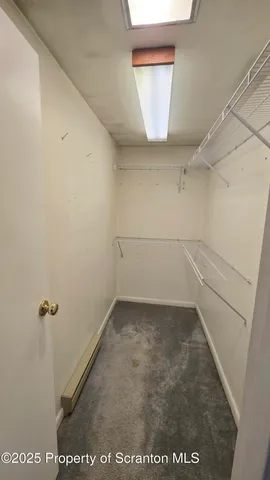 a closeup of a cabinet with mirror and window