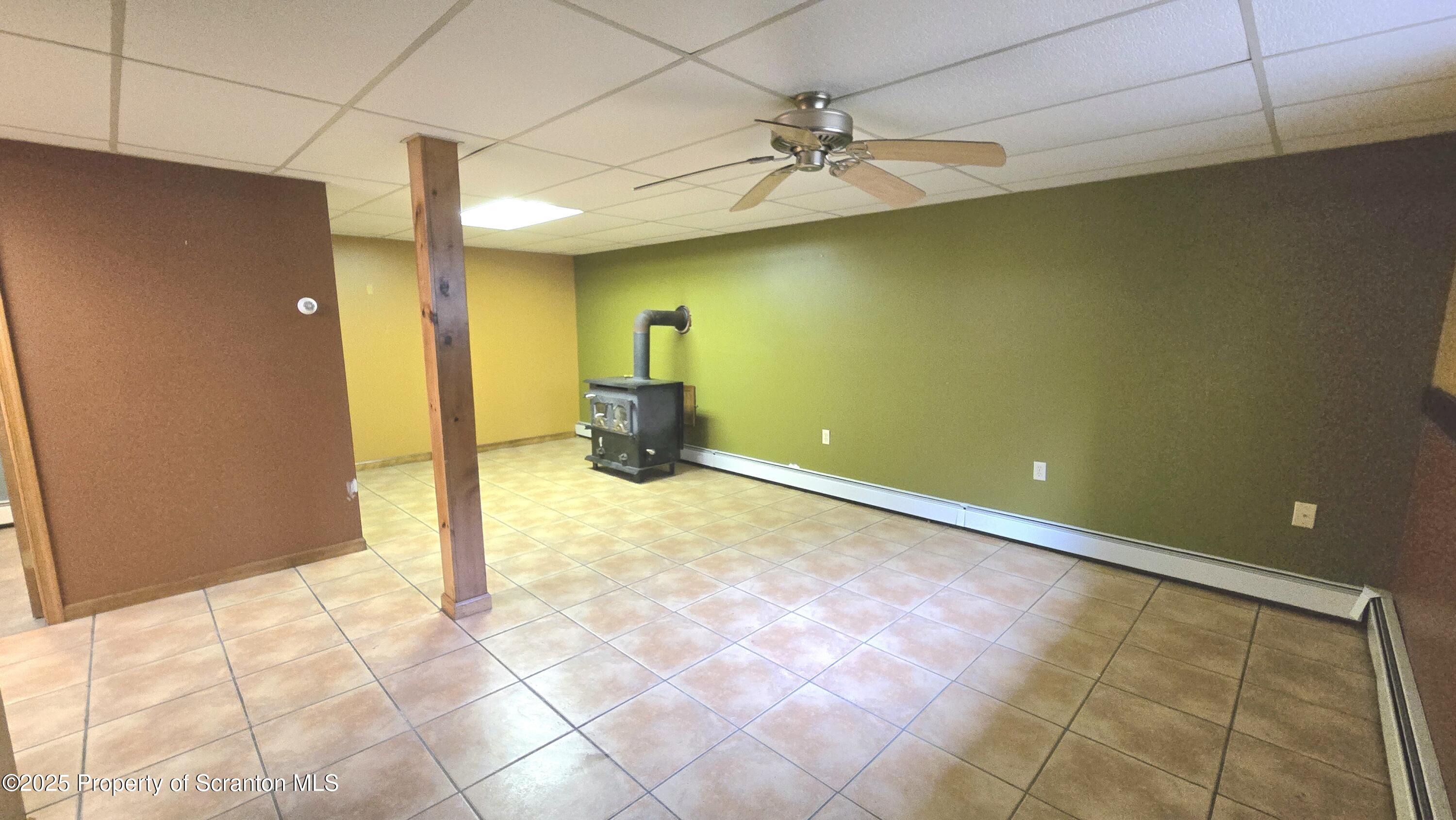 2311 Motichka Road Moscow, PA 18444 - Photo 24 of 89 a view of a livingroom with a staircase