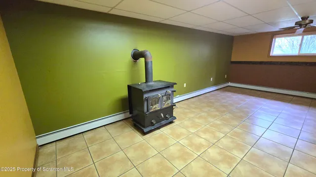 a view of an empty room with windows