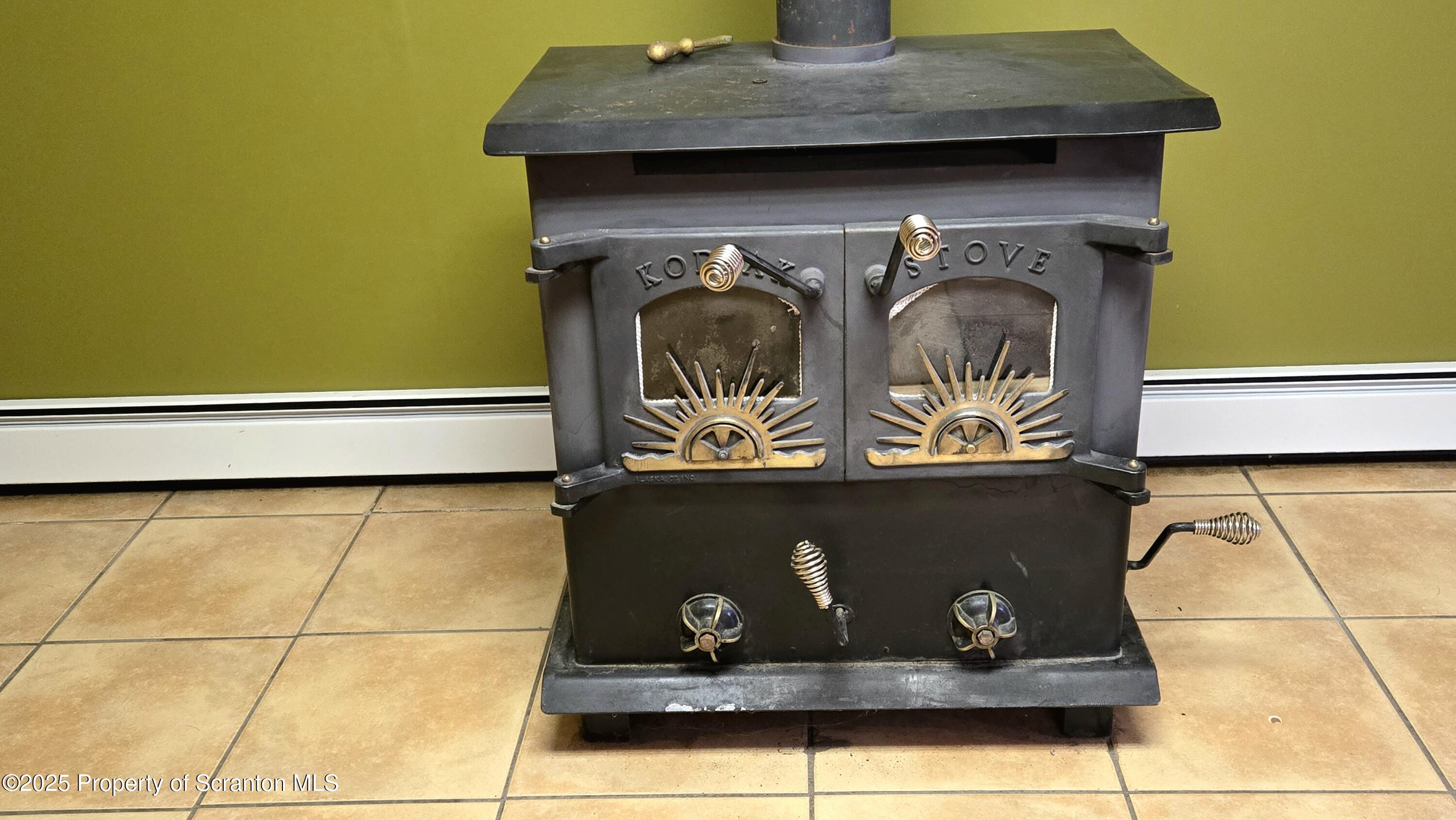 2311 Motichka Road Moscow, PA 18444 - Photo 26 of 89 a closeup of a cabinet with mirror and window