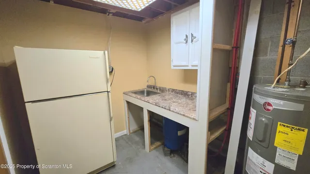 a bathroom with a sink and a shower