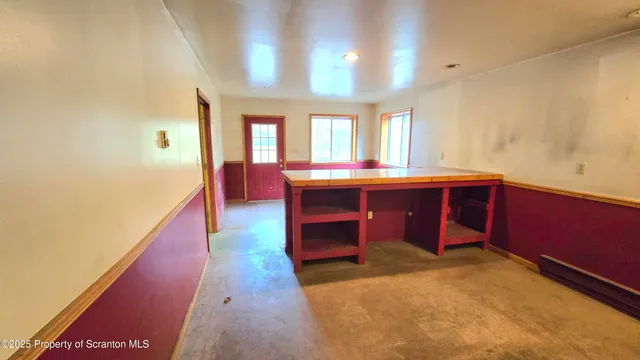 a view of a street with wooden floor