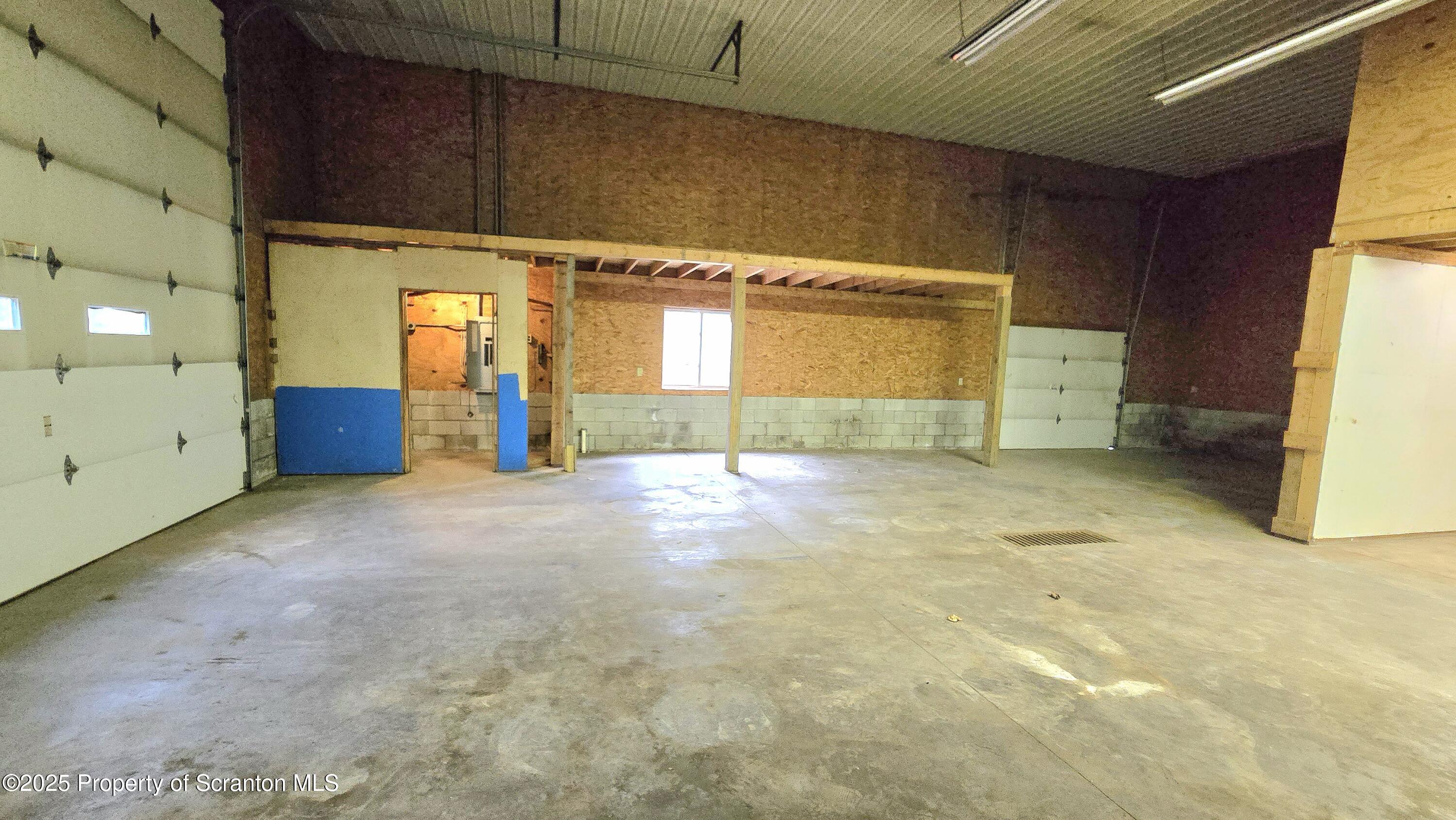2311 Motichka Road Moscow, PA 18444 - Photo 57 of 89 a view of an empty room with a fireplace