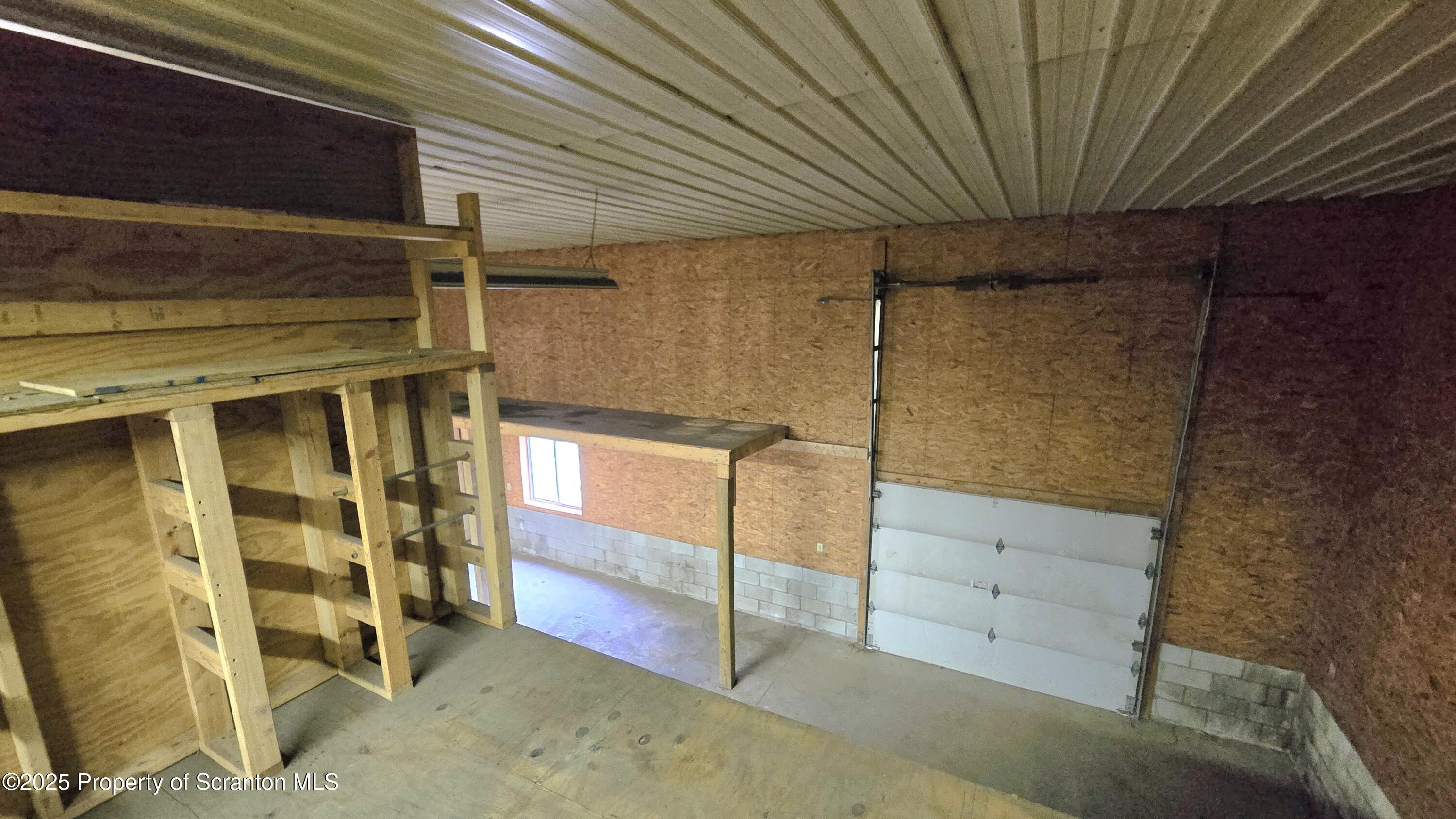 2311 Motichka Road Moscow, PA 18444 - Photo 63 of 89 a view of a room with racks on the wall