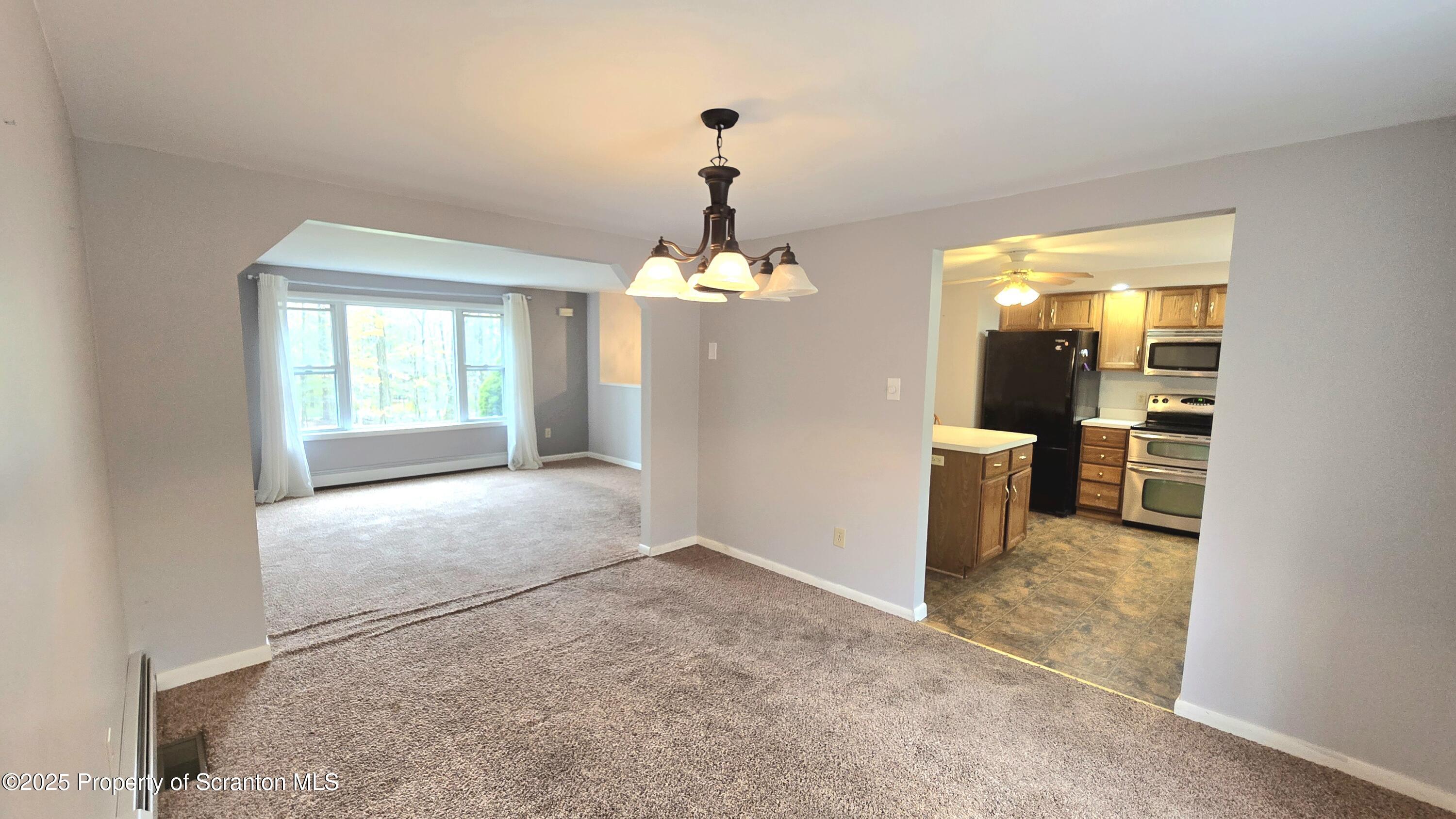 2311 Motichka Road Moscow, PA 18444 - Photo 7 of 89 a view of livingroom with window