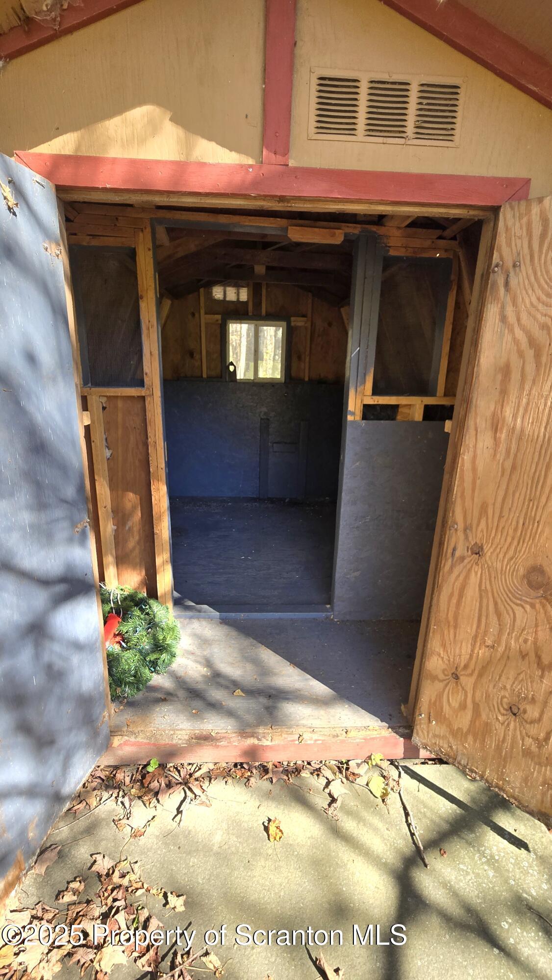 2311 Motichka Road Moscow, PA 18444 - Photo 87 of 89 a front view of a house with a yard