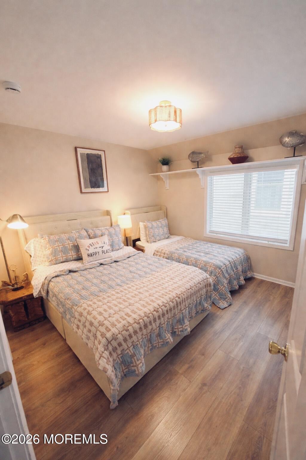 520 Brighton Avenue Spring Lake, NJ 07762 - Photo 14 of 25 a bedroom with a bed and a night stand