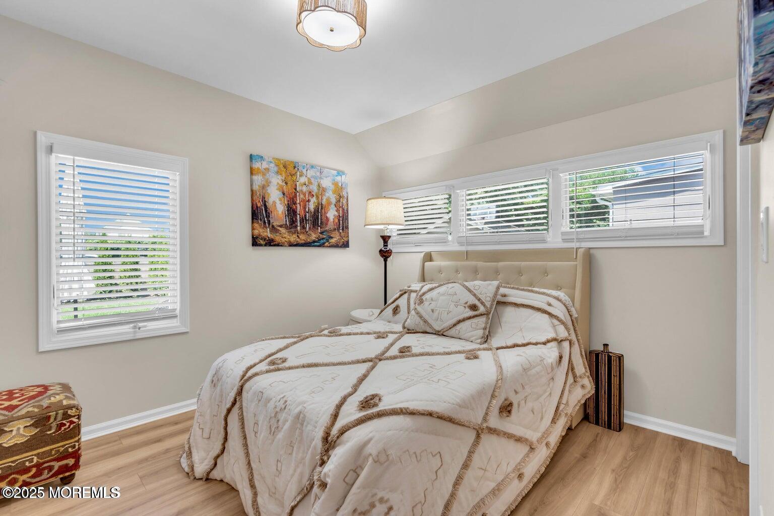 520 Brighton Avenue Spring Lake, NJ 07762 - Photo 16 of 25 a bedroom with a bed and a window