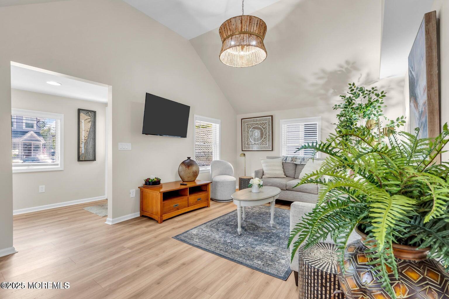 520 Brighton Avenue Spring Lake, NJ 07762 - Photo 8 of 25 a living room with furniture plant and a window
