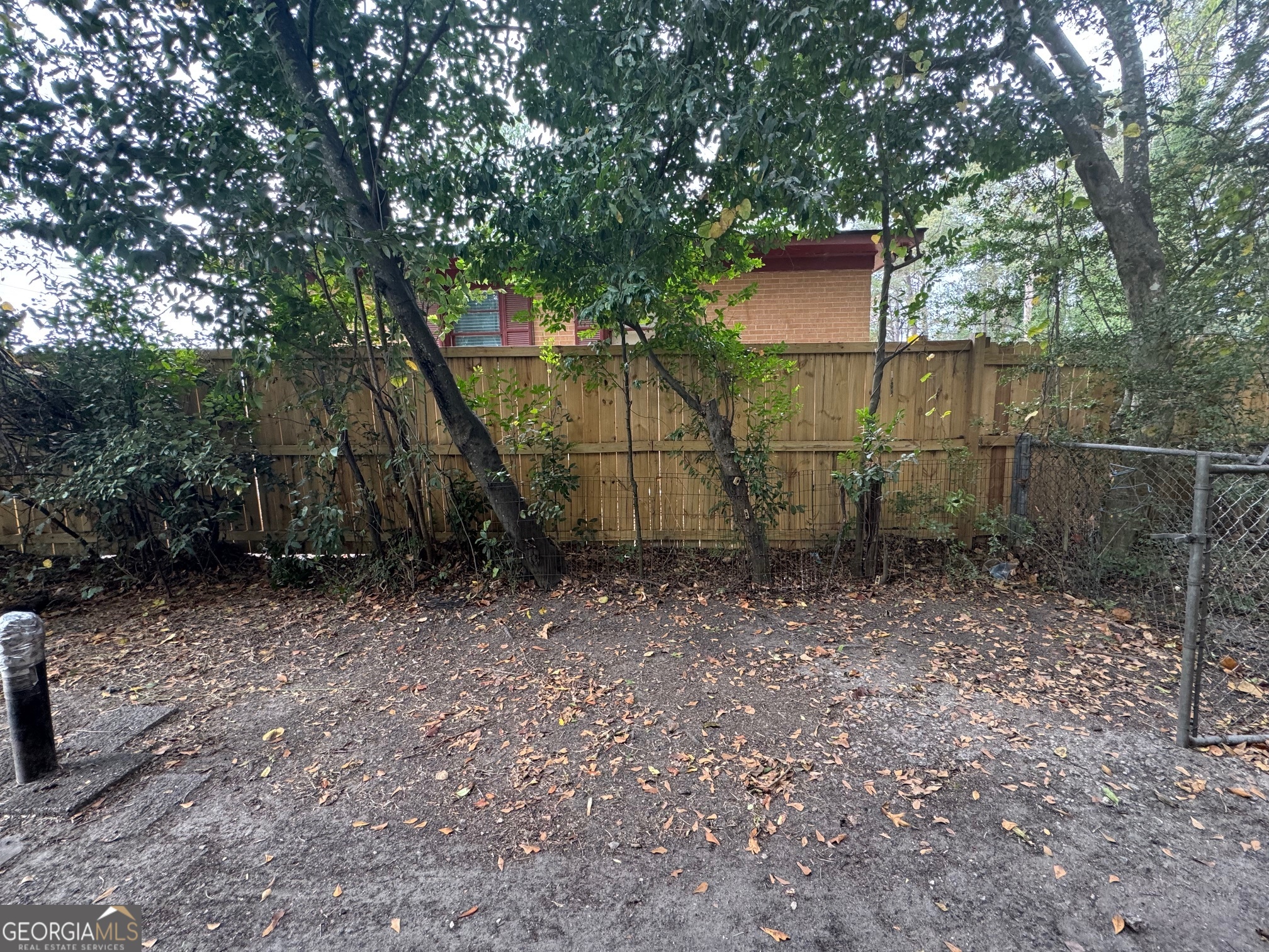 3515 Greenbriar Road Macon, GA 31204 - Photo 21 of 22 a backyard of a house with lots of green space