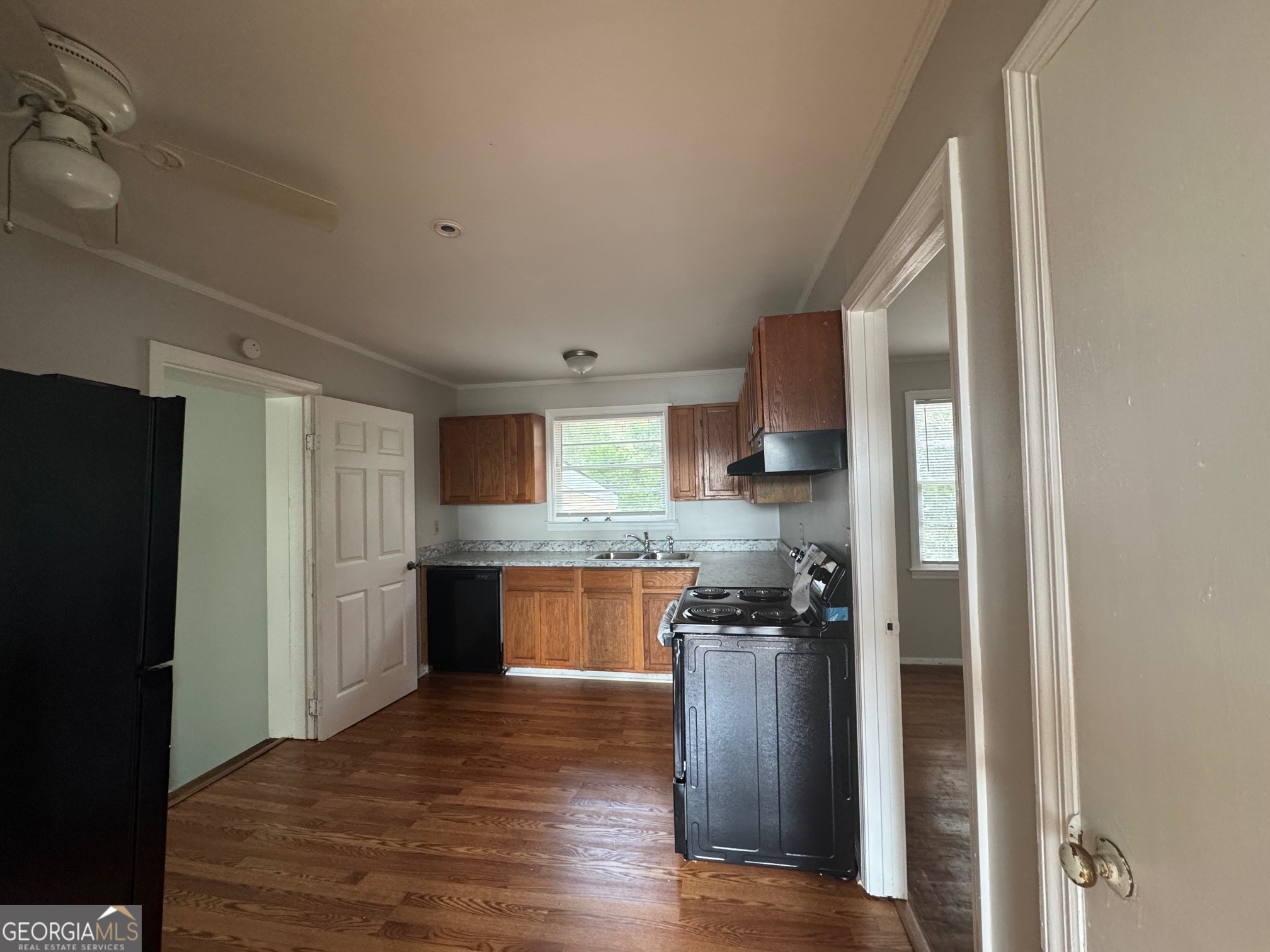 3515 Greenbriar Road Macon, GA 31204 - Photo 6 of 22 a kitchen with stainless steel appliances granite countertop a refrigerator and a sink