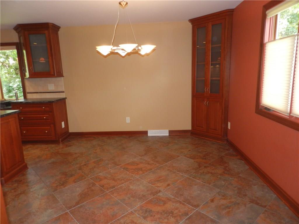 2533 Riva Ridge Court Franklin Park, PA 15090 - Photo 12 of 25 Large dining area with natural light and a charming built in corner hutch.